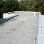 oprava ploché asfaltové střechy.